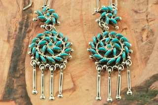 Stunning Earrings featuring Genuine Sleeping Beauty Turquoise set in Sterling Silver. Beautiful Petit Point Design. Many days of painstaking work went into creating this Southwestern Art Masterpiece. Created by Master Zuni Artists Octavious and Irma Seowtewa. Signed by the artists.  The Zuni Pueblo is located in New Mexico, Land of Enchantment.